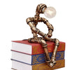 Vintage Steampunk Desk Lamp: Industrial Robot Pipe Light